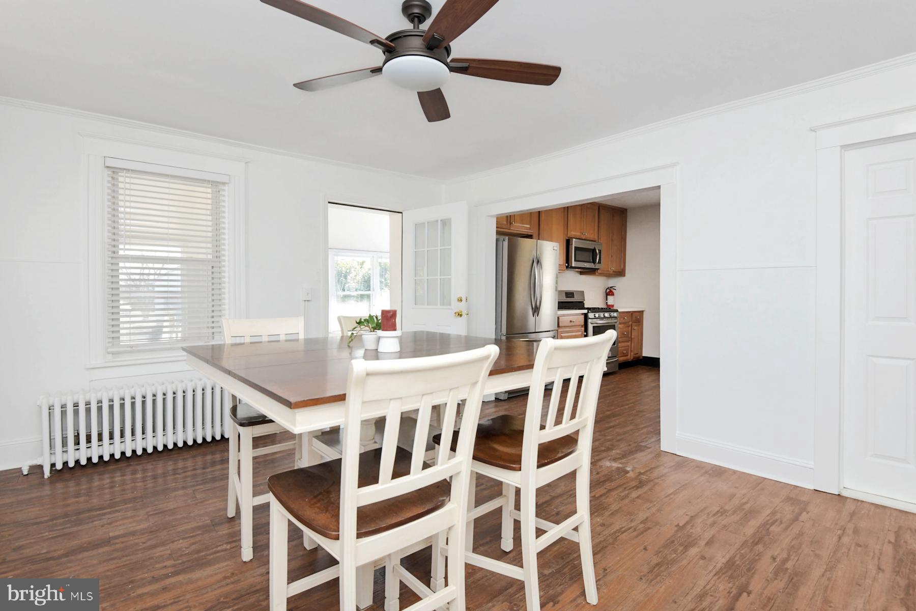 1740 Prospect Street Ewing, NJ 08638 - Photo 8 of 26 a view of a dining room with furniture and wooden floor