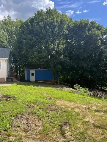 a view of an empty room with a yard