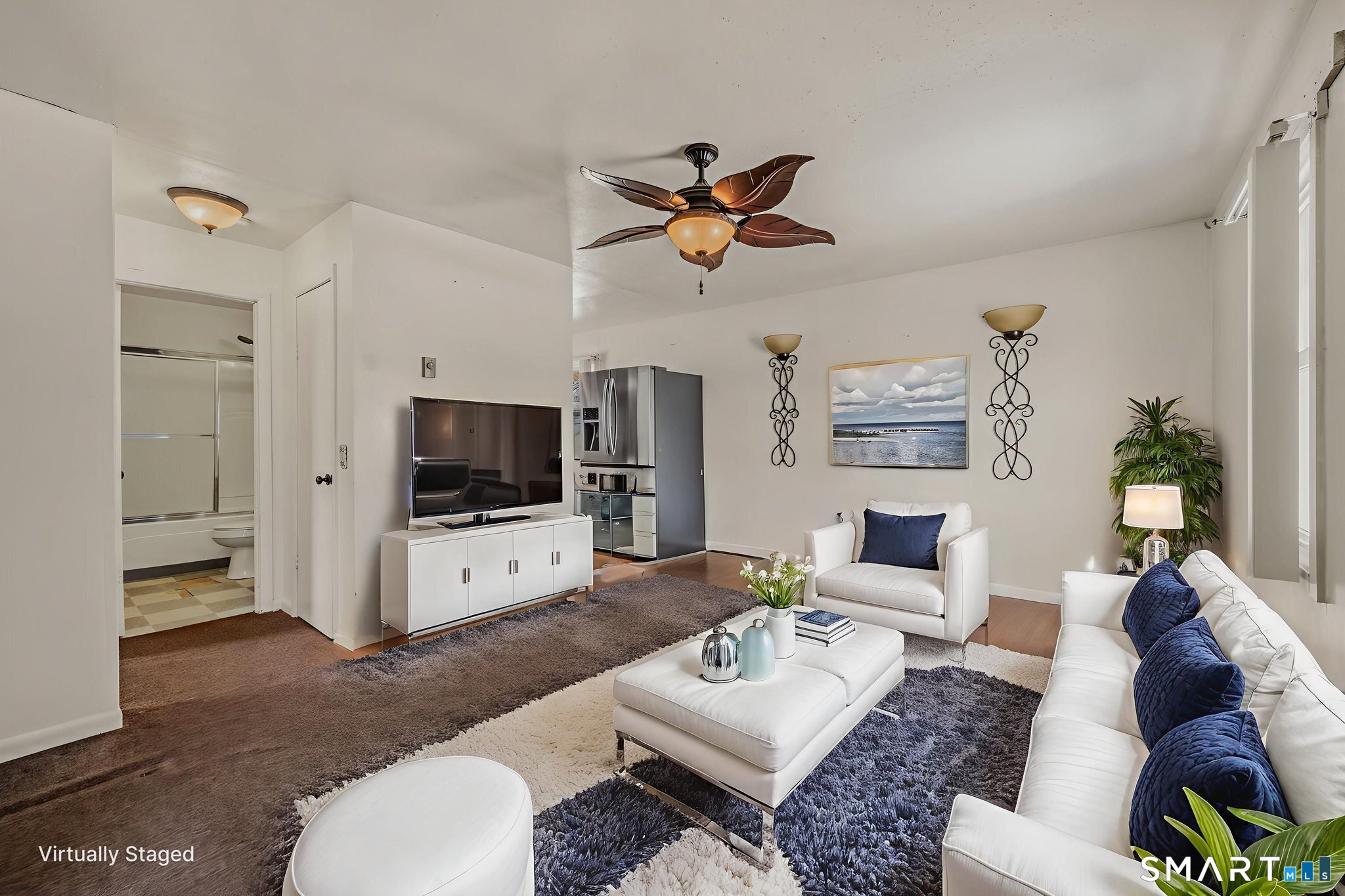 209 Midway Ovl Groton, CT 06340 - Photo 11 of 31 a living room with furniture and a flat screen tv