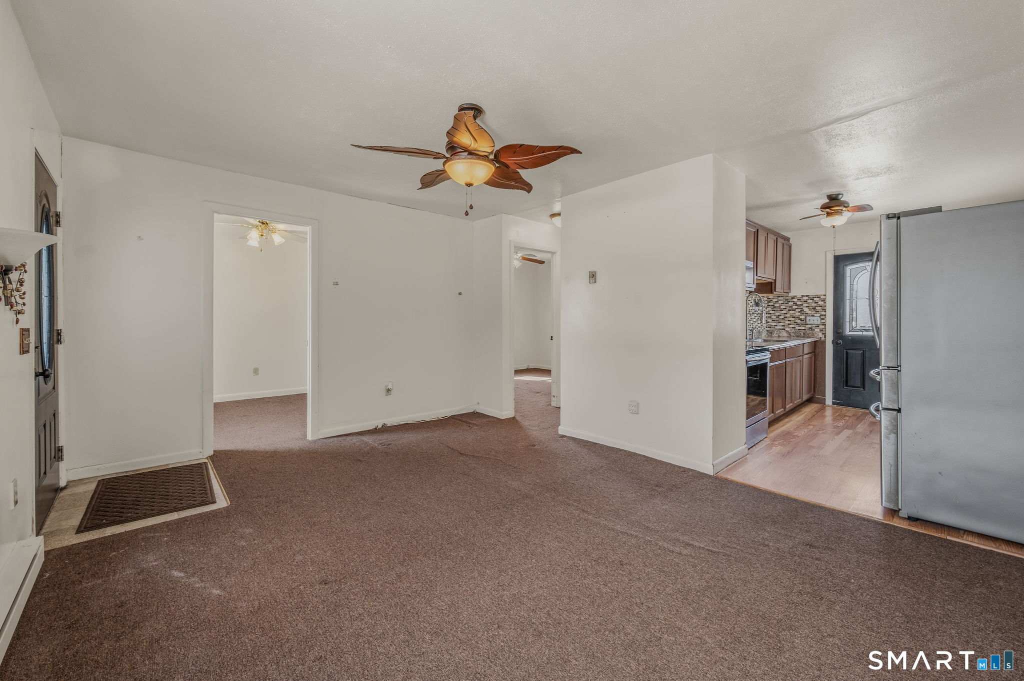 209 Midway Ovl Groton, CT 06340 - Photo 12 of 31 wooden floor in an empty room with a window