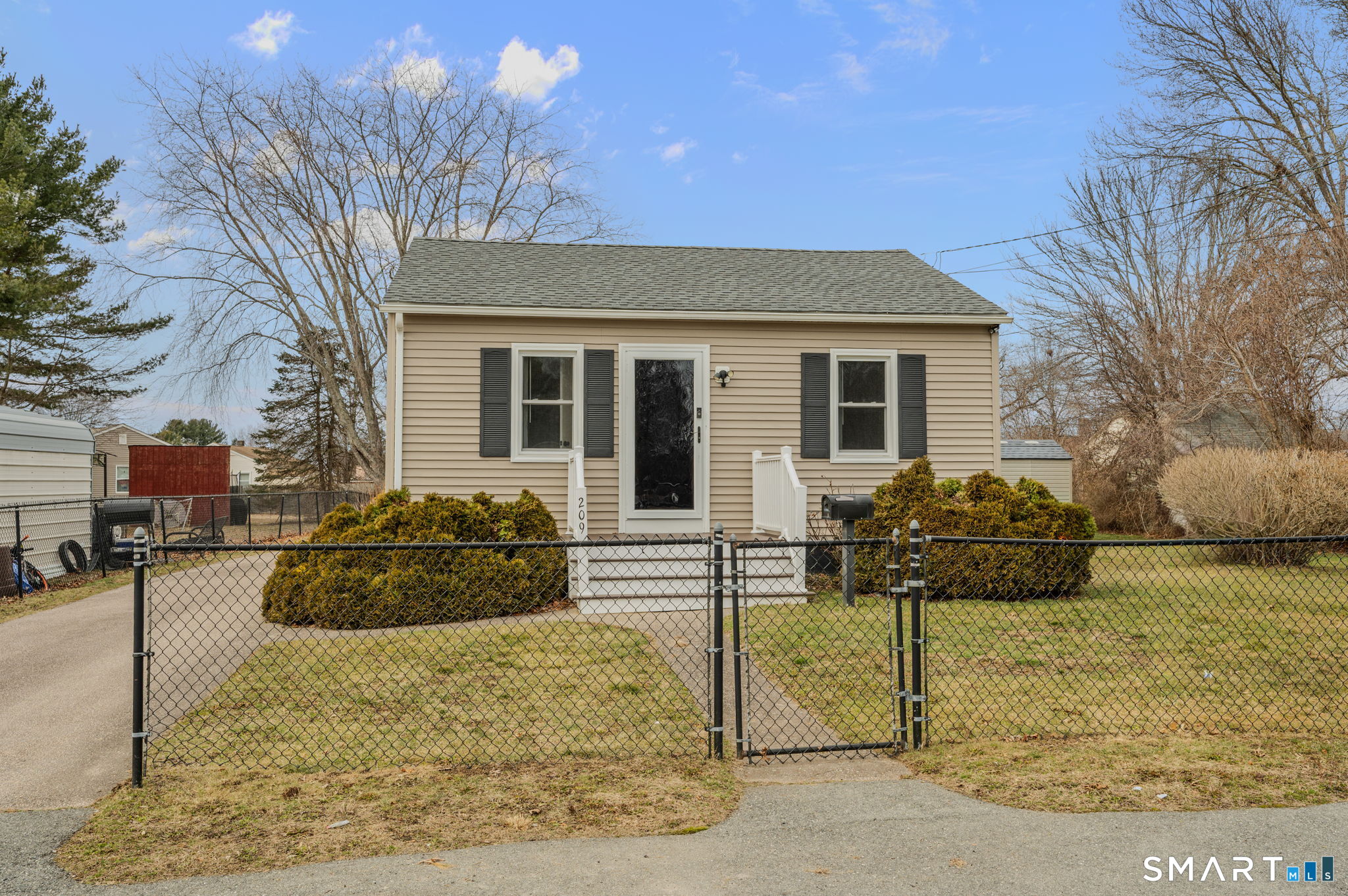 209 Midway Ovl Groton, CT 06340 - Photo 2 of 31 a front view of a house with entertaining space