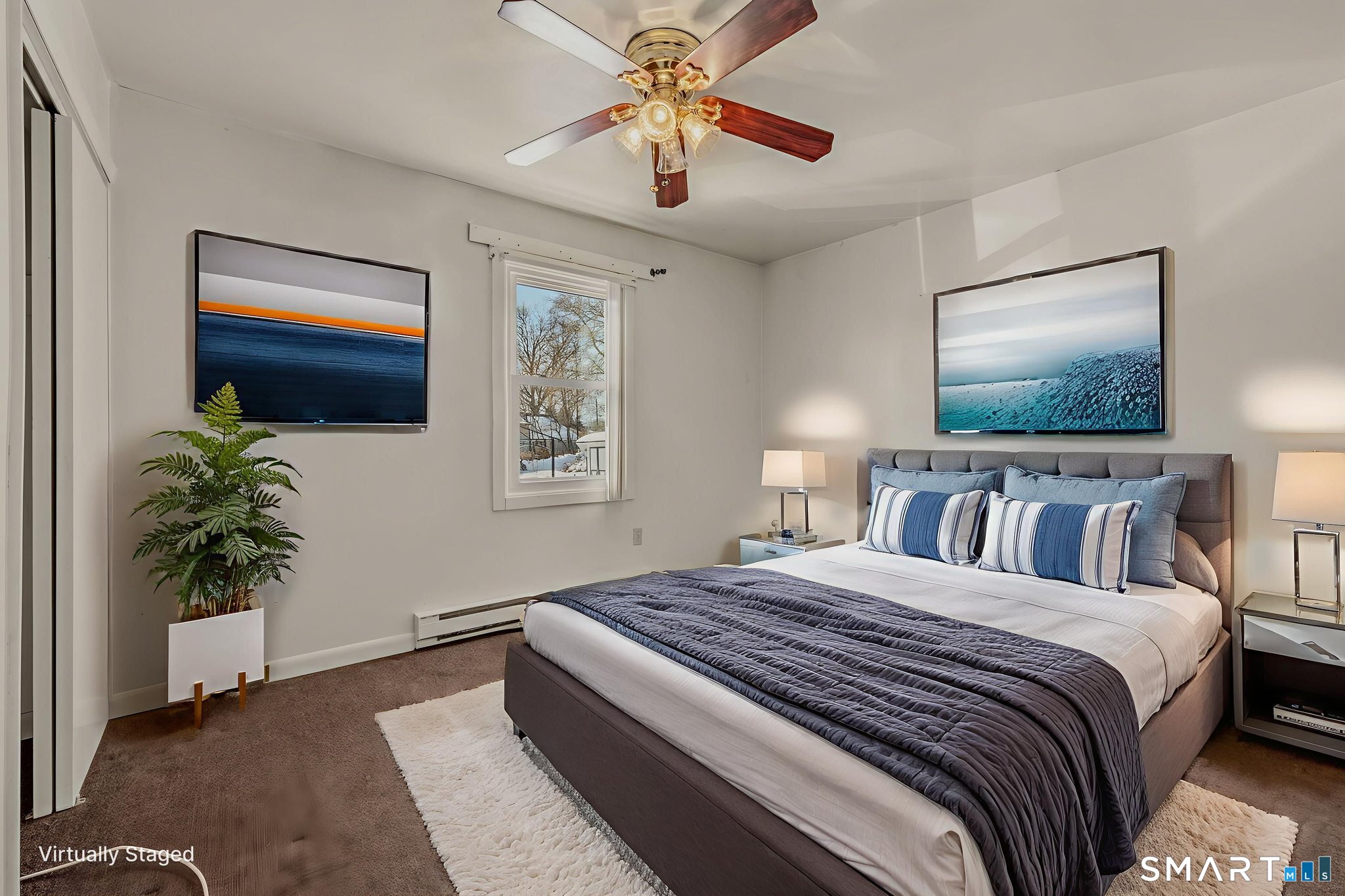 209 Midway Ovl Groton, CT 06340 - Photo 22 of 31 a bedroom with a bed and a chandelier