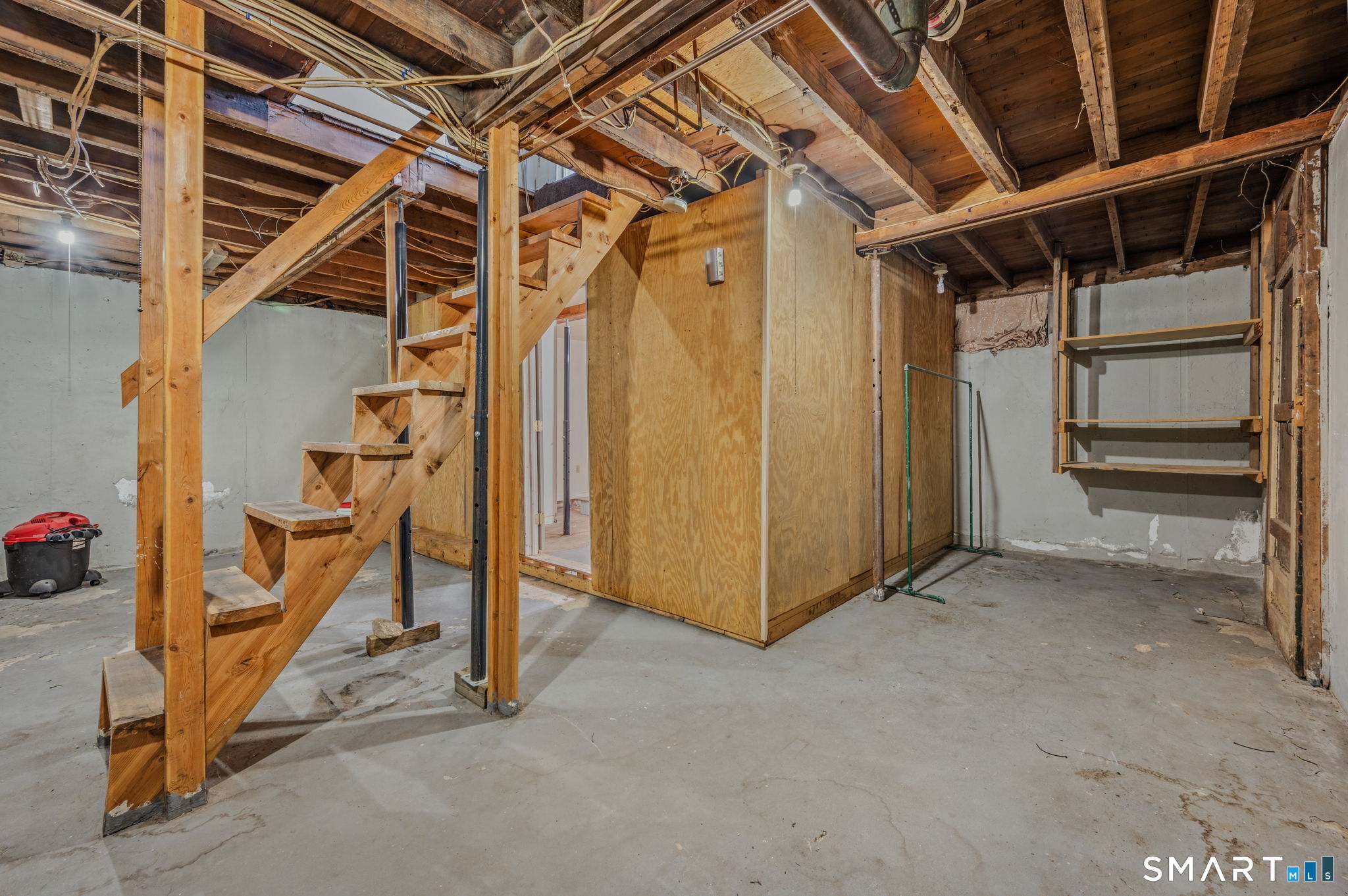 209 Midway Ovl Groton, CT 06340 - Photo 27 of 31 a view of an empty room with stairs