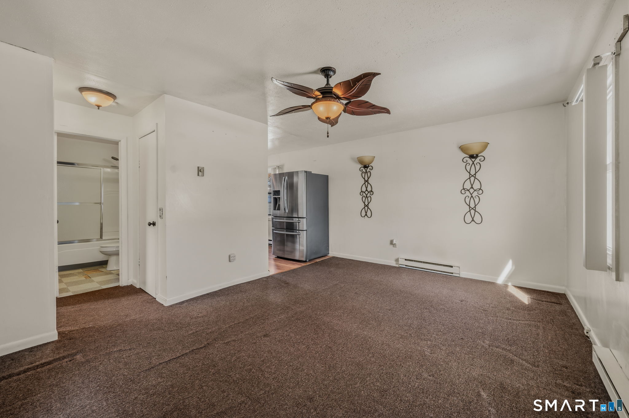 209 Midway Ovl Groton, CT 06340 - Photo 10 of 31 an empty room with closet and a ceiling fan
