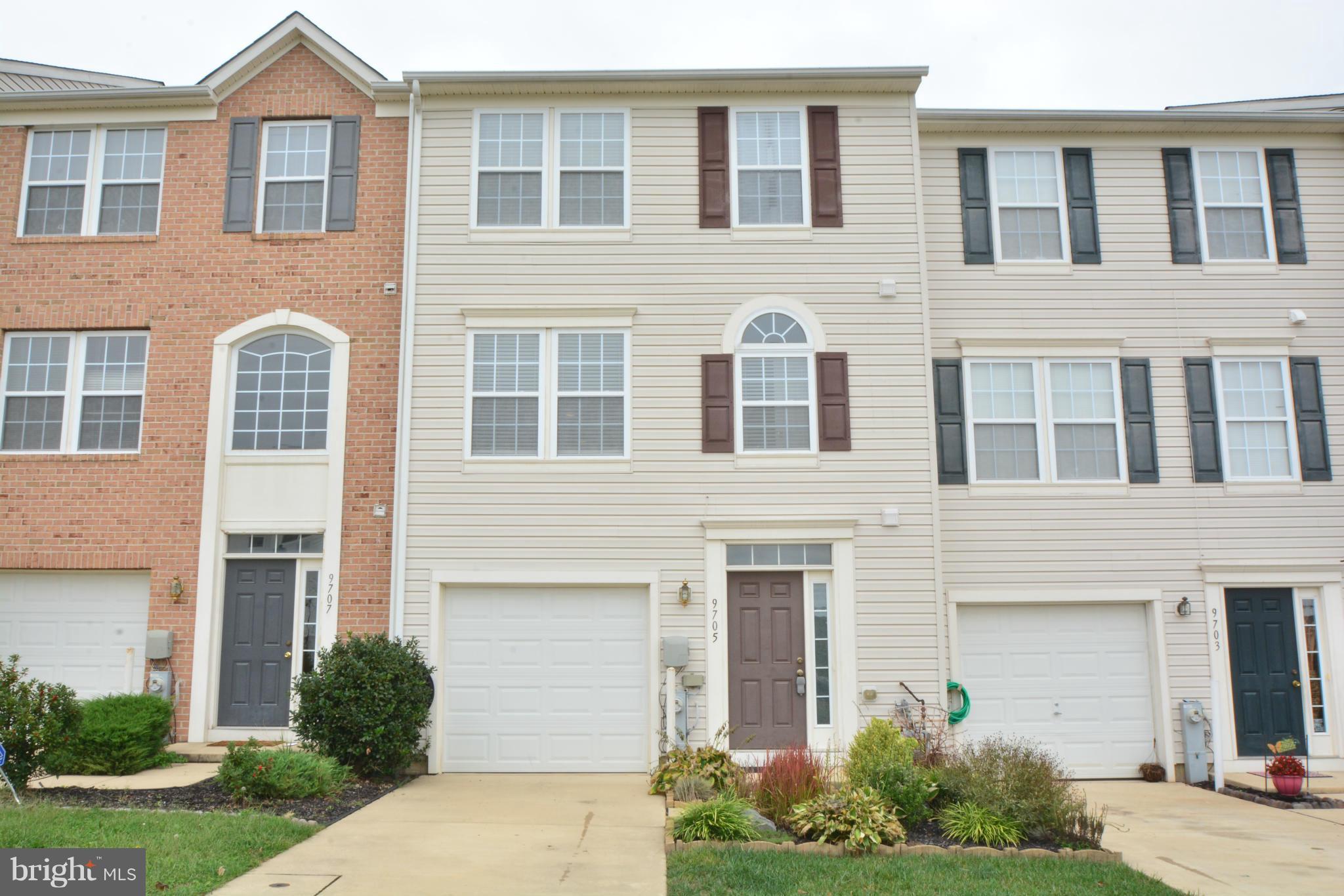9705 Selfridge Road Baltimore, MD 21220 - Photo 1 of 30 a front view of a house with garden