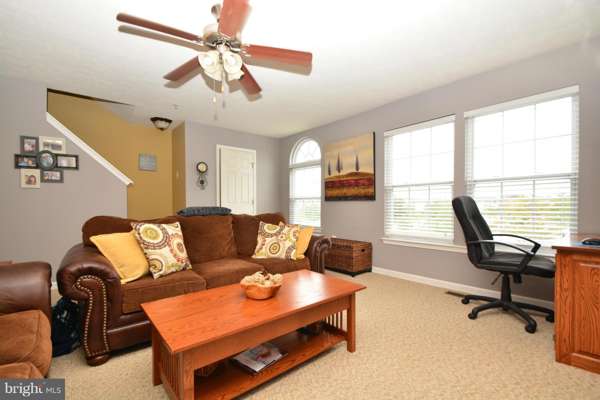 9705 Selfridge Road Baltimore, MD 21220 - Photo 18 of 30 a living room with furniture and a window