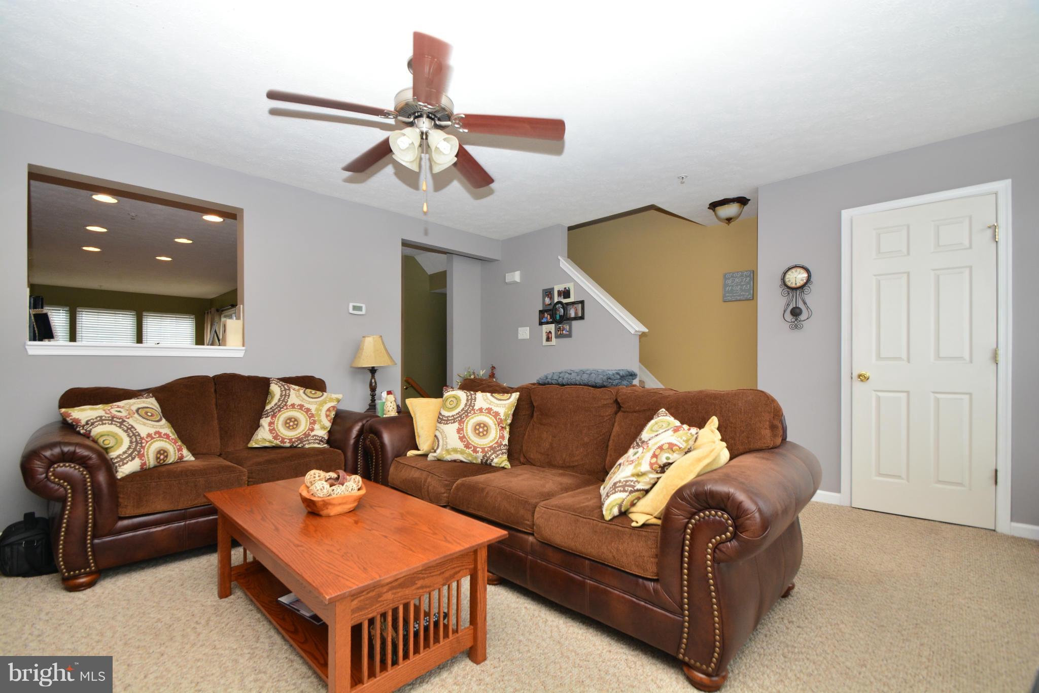 9705 Selfridge Road Baltimore, MD 21220 - Photo 19 of 30 a living room with furniture and a ceiling fan