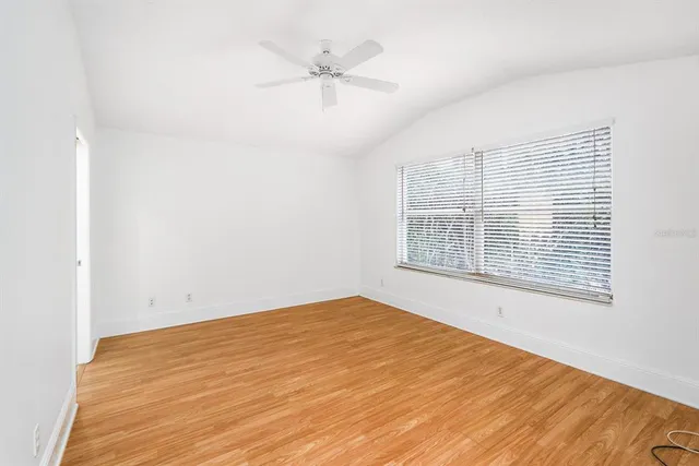 a bathroom with a double vanity sink mirror and shower