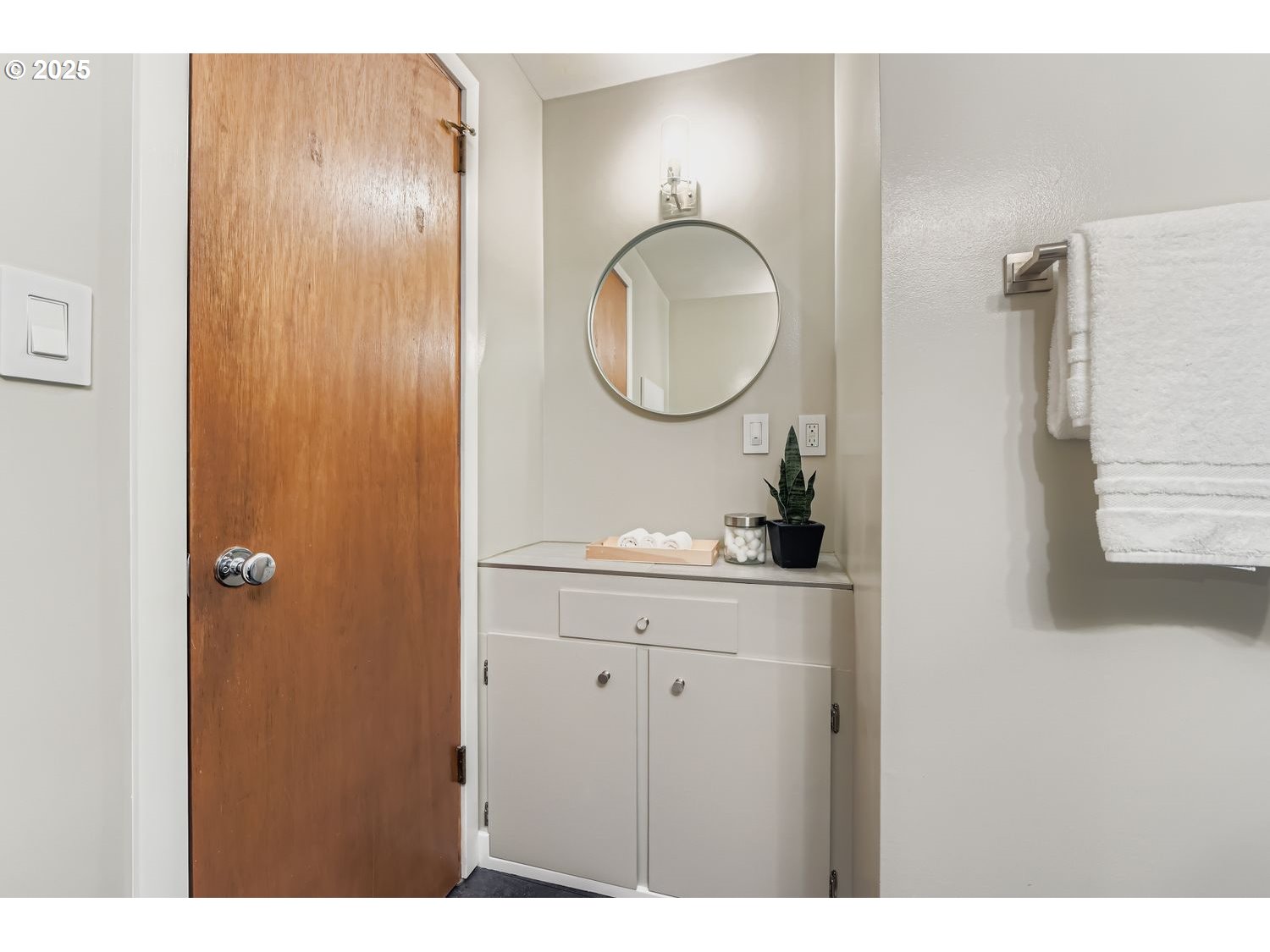 2728 Southeast 175th Place Portland, OR 97236 - Photo 17 of 33 a bathroom with a sink and a mirror