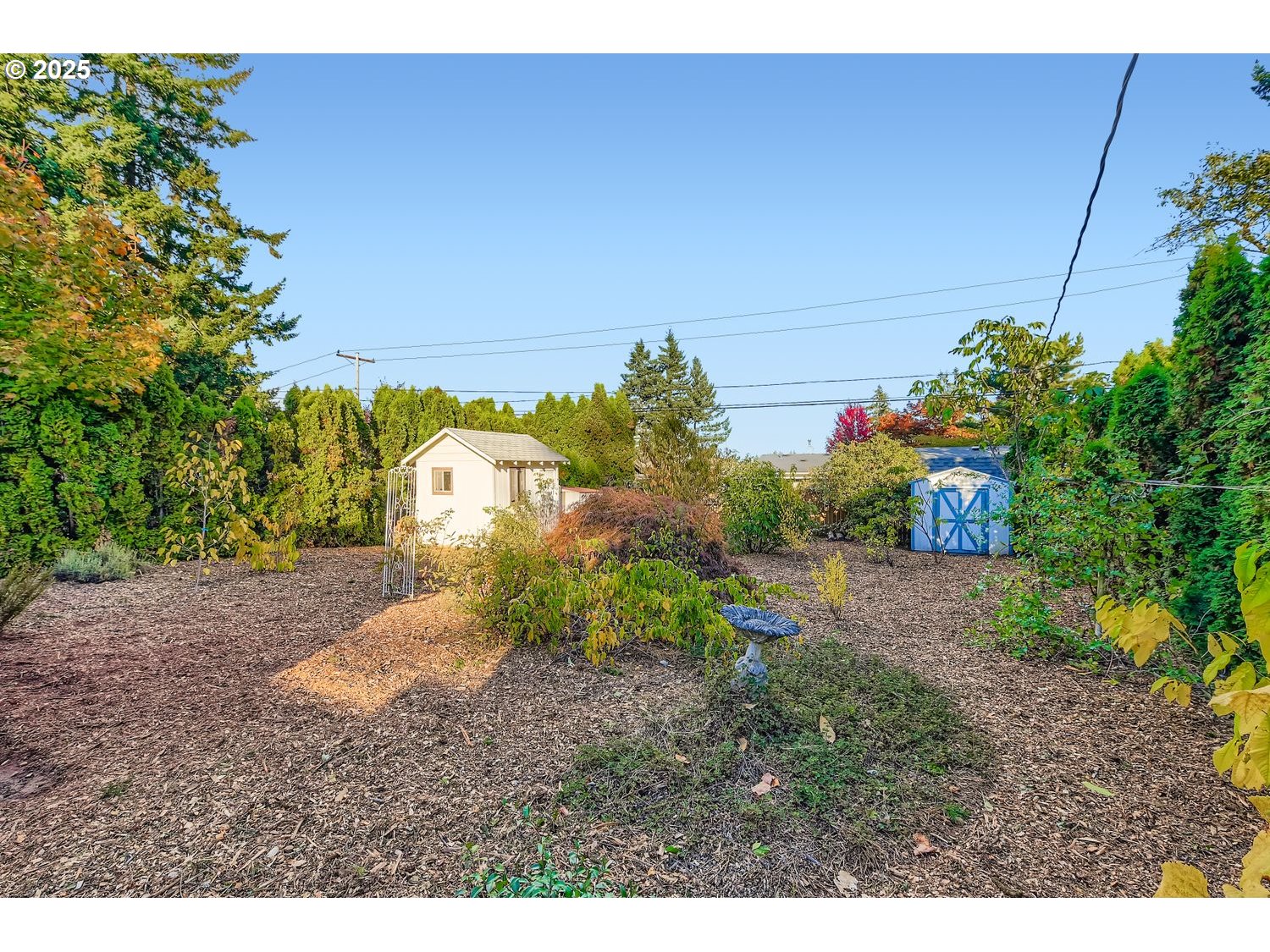 2728 Southeast 175th Place Portland, OR 97236 - Photo 25 of 33 a backyard of a house with lots of green space