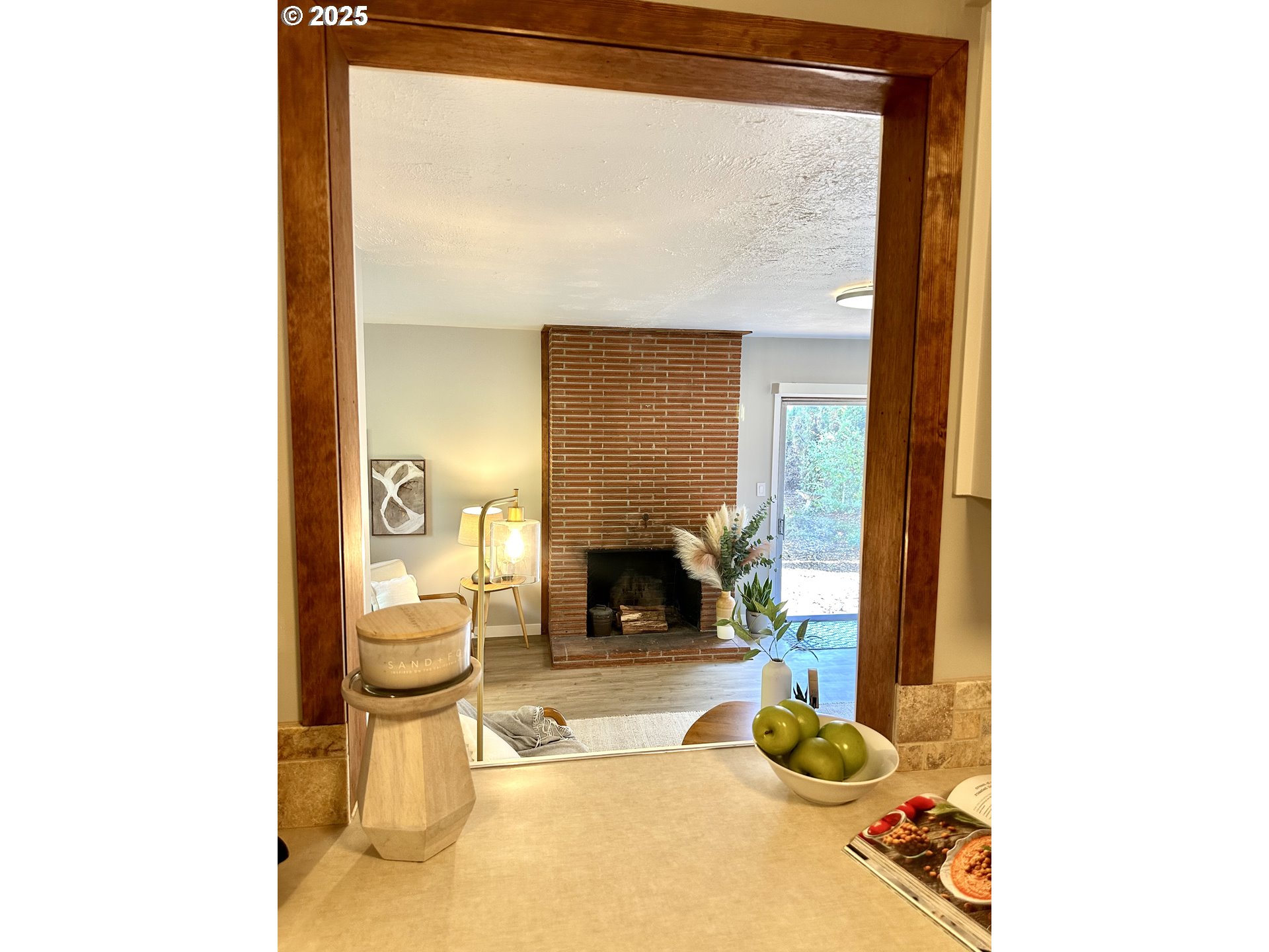 2728 Southeast 175th Place Portland, OR 97236 - Photo 33 of 33 a living room with a couch and a fireplace