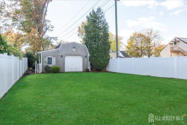 a view of a back yard with green space