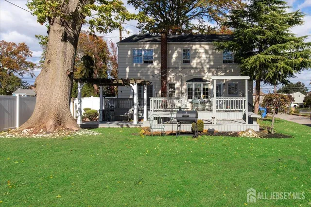 a view of a house with a yard porch and sitting area