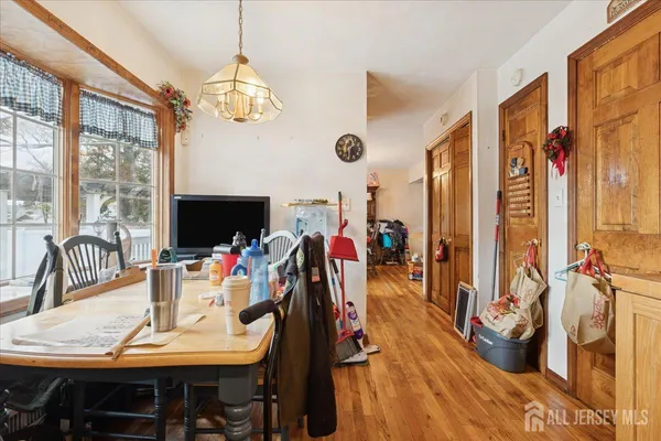 a view of a dining room with furniture window and outside view