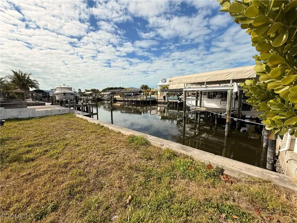 a view of a swimming pool with seating area