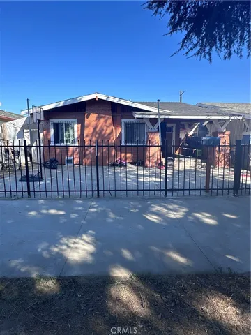 a view of a house with a street