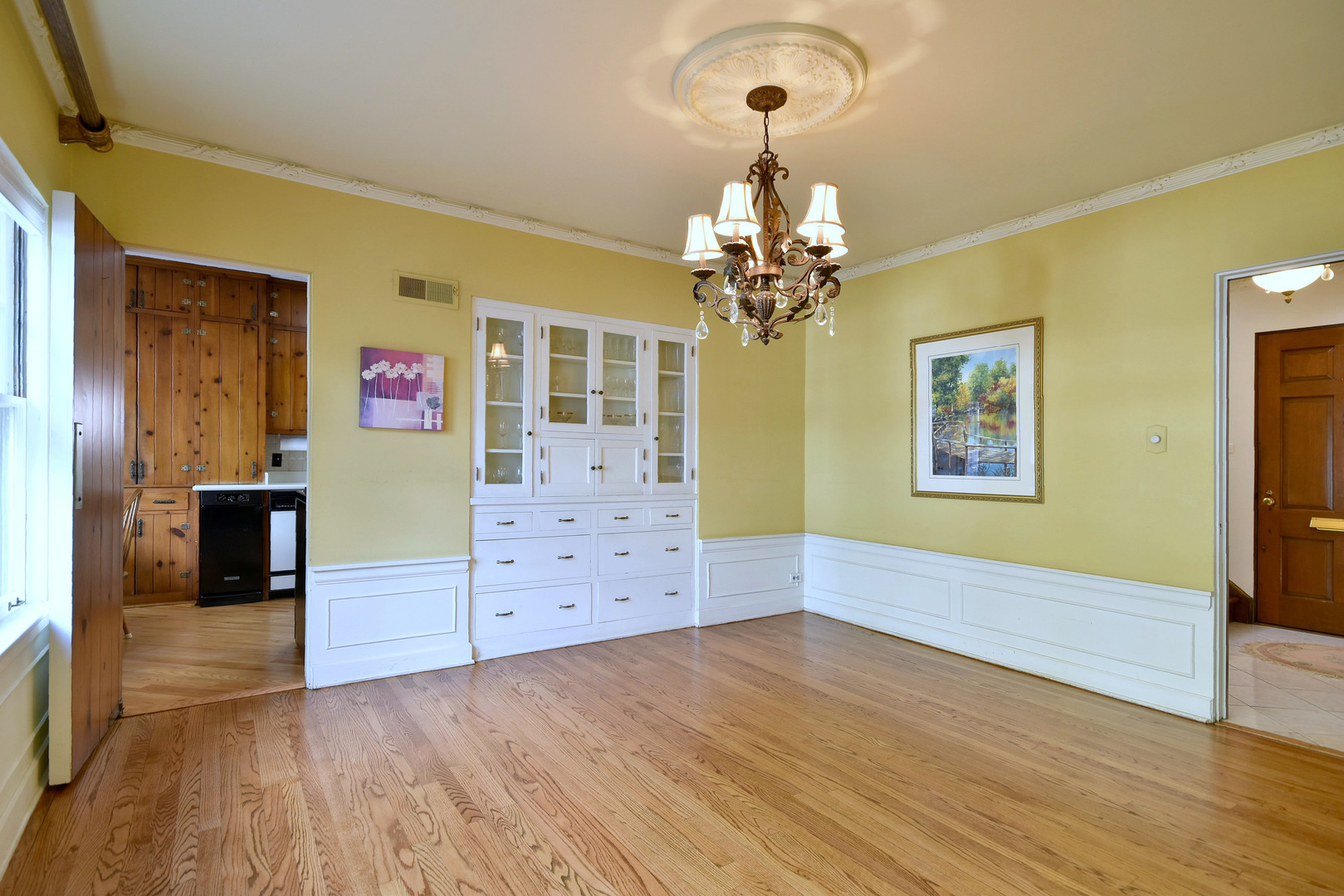 196 Fairfield Avenue Elmhurst, IL 60126 - Photo 12 of 44 wooden floor in an empty room with a mirror
