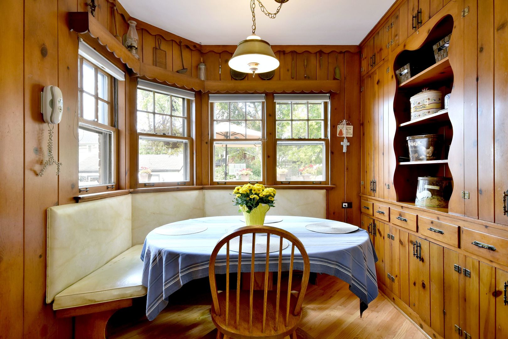 196 Fairfield Avenue Elmhurst, IL 60126 - Photo 15 of 44 a dining room with furniture window and wooden floor
