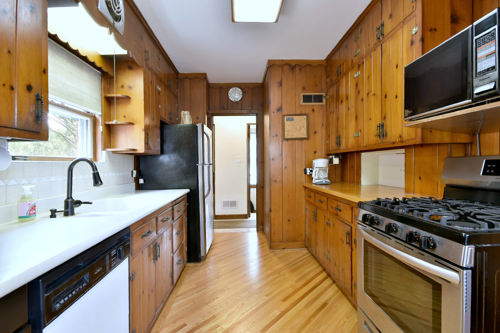 196 Fairfield Avenue Elmhurst, IL 60126 - Photo 17 of 44 a kitchen with stainless steel appliances granite countertop a sink stove and refrigerator