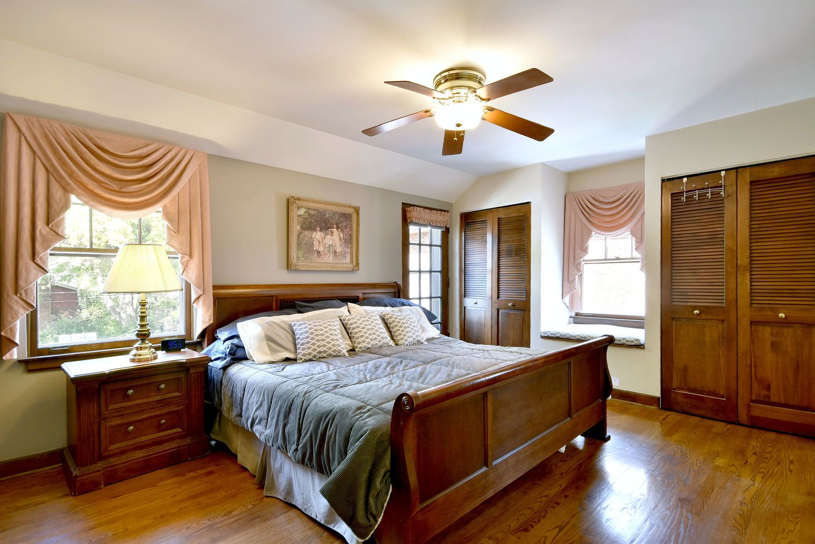 196 Fairfield Avenue Elmhurst, IL 60126 - Photo 20 of 44 a bedroom with a large bed and a window