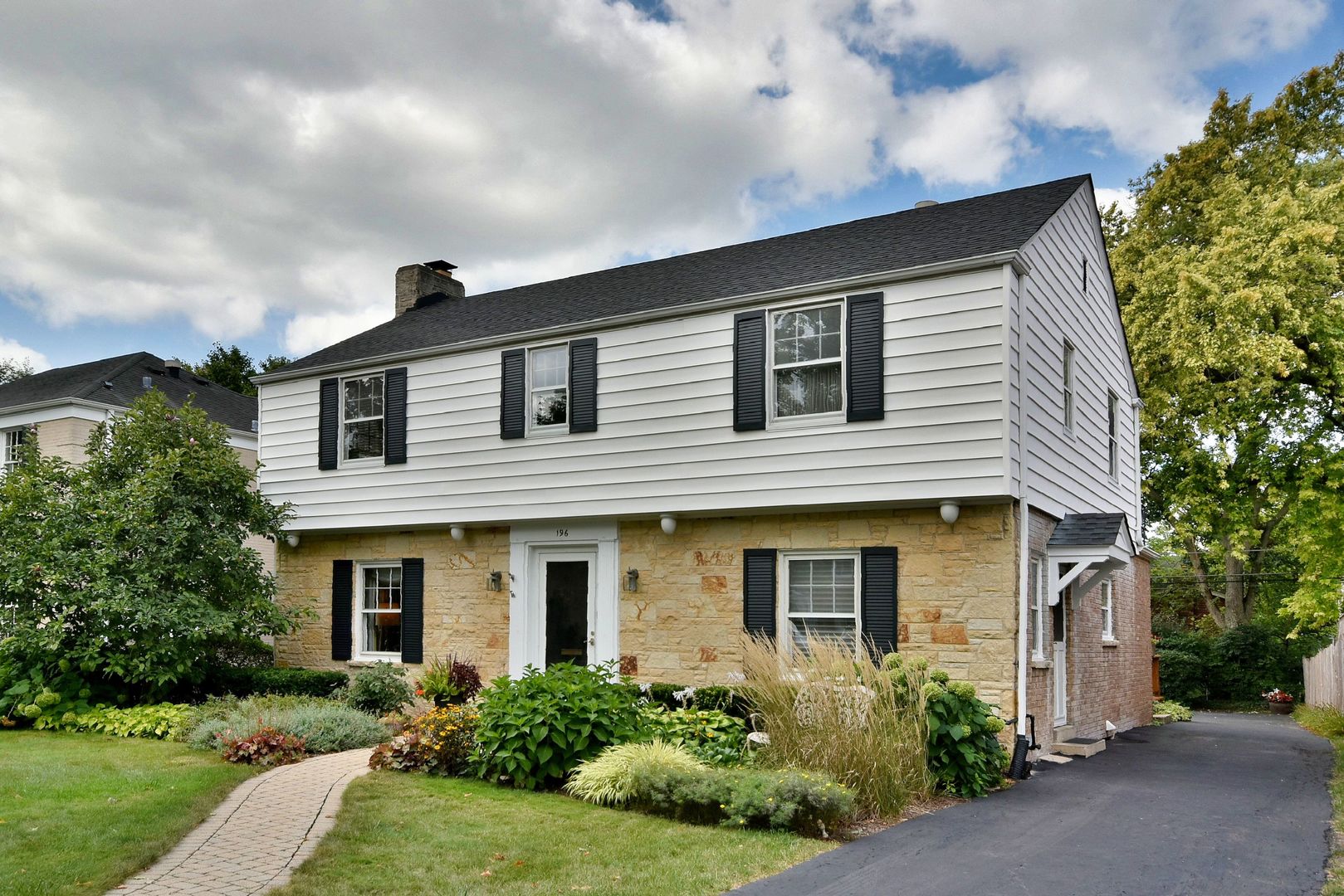 196 Fairfield Avenue Elmhurst, IL 60126 - Photo 2 of 44 a front view of a house with a yard