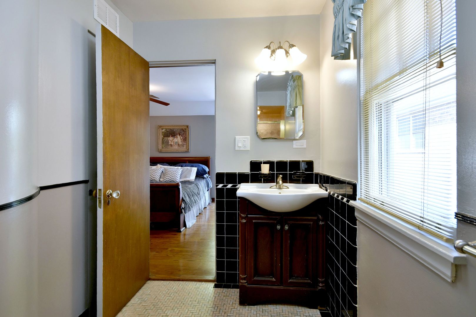 196 Fairfield Avenue Elmhurst, IL 60126 - Photo 23 of 44 a bathroom with a sink and a mirror