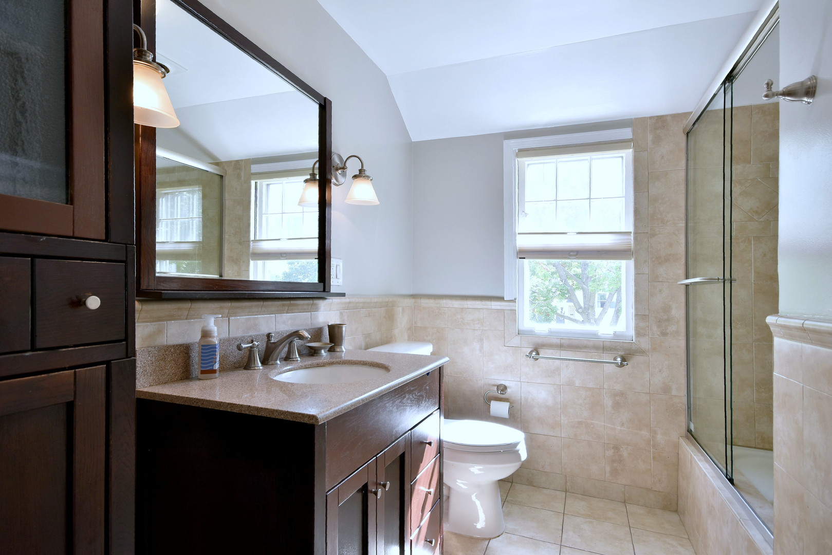 196 Fairfield Avenue Elmhurst, IL 60126 - Photo 24 of 44 a bathroom with a double vanity sink toilet and a mirror