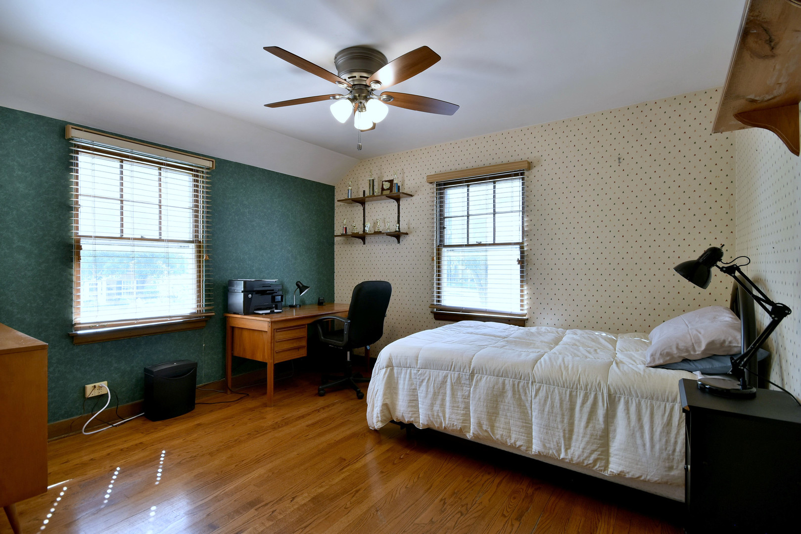 196 Fairfield Avenue Elmhurst, IL 60126 - Photo 28 of 44 a bedroom with a bed and a chandelier