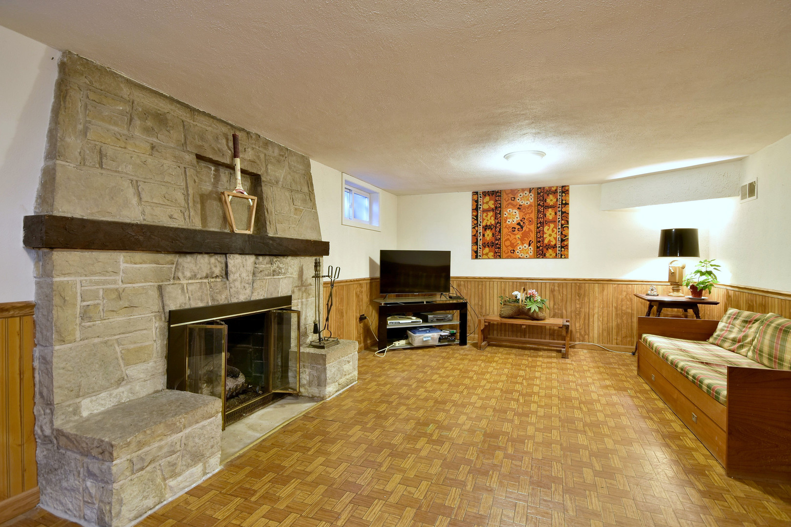 196 Fairfield Avenue Elmhurst, IL 60126 - Photo 30 of 44 a living room with furniture and a fireplace