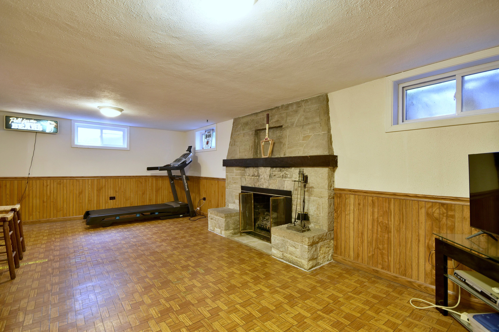 196 Fairfield Avenue Elmhurst, IL 60126 - Photo 33 of 44 a living room with furniture and a fireplace