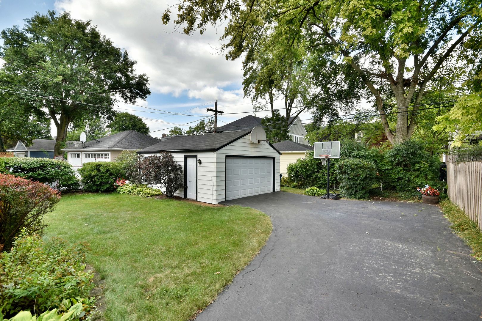 196 Fairfield Avenue Elmhurst, IL 60126 - Photo 36 of 44 a view of a house with a yard and large trees