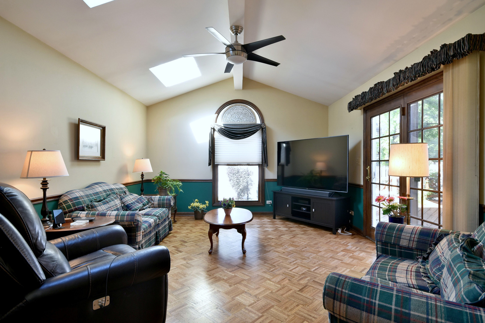 196 Fairfield Avenue Elmhurst, IL 60126 - Photo 10 of 44 a living room with furniture and a flat screen tv