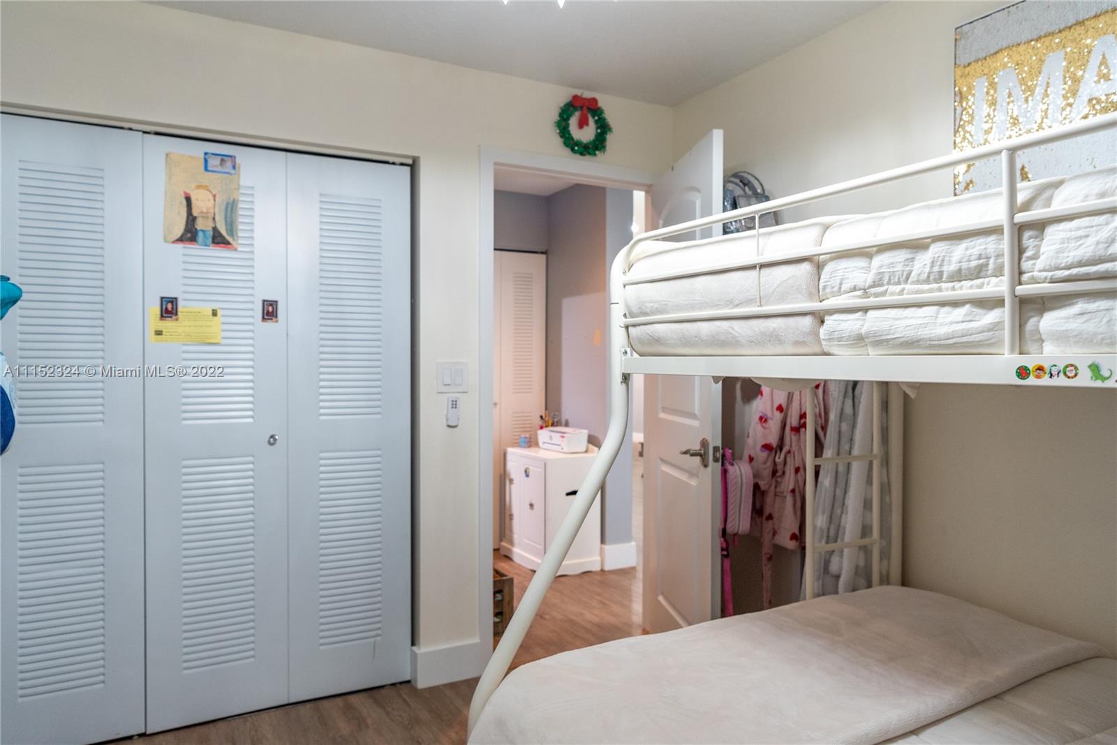 21356 Summertrace Circle Boca Raton, FL 33428 - Photo 15 of 21 a bed room with a bed and a window