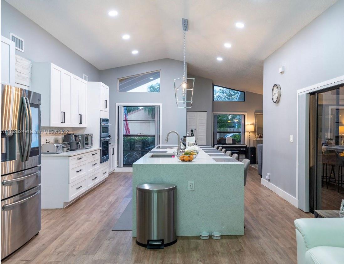 21356 Summertrace Circle Boca Raton, FL 33428 - Photo 2 of 21 a view of kitchen with furniture and wooden floor