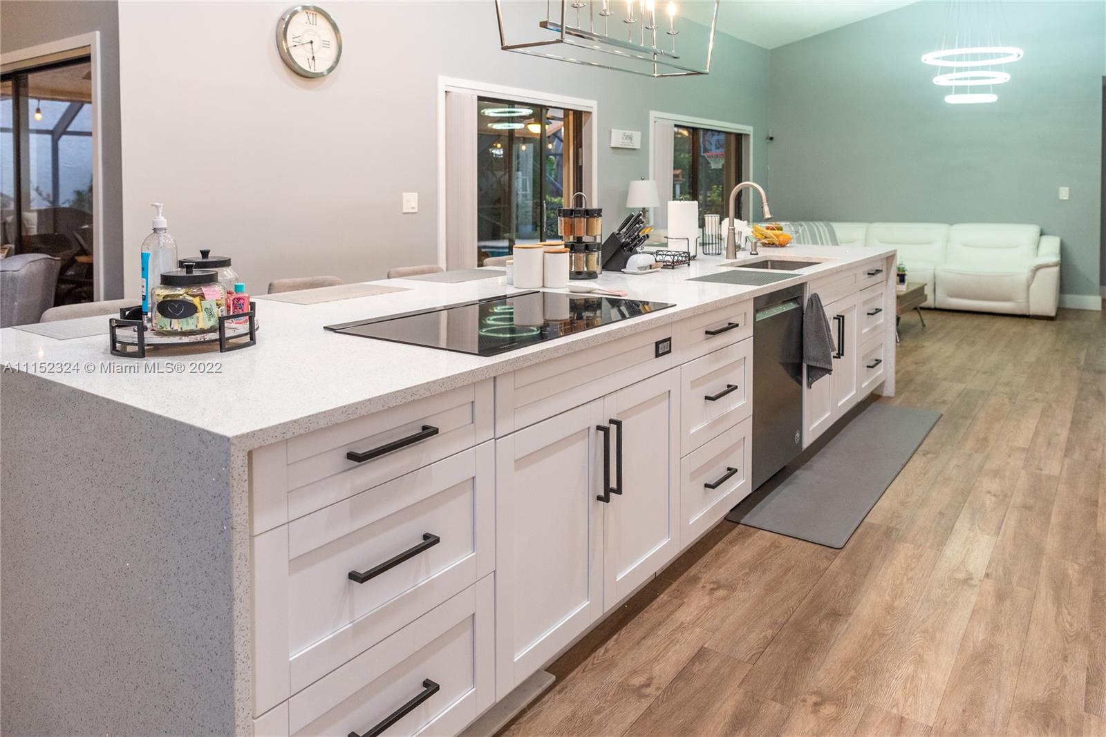 21356 Summertrace Circle Boca Raton, FL 33428 - Photo 4 of 21 a view of a kitchen counter space a stove the kitchen island
