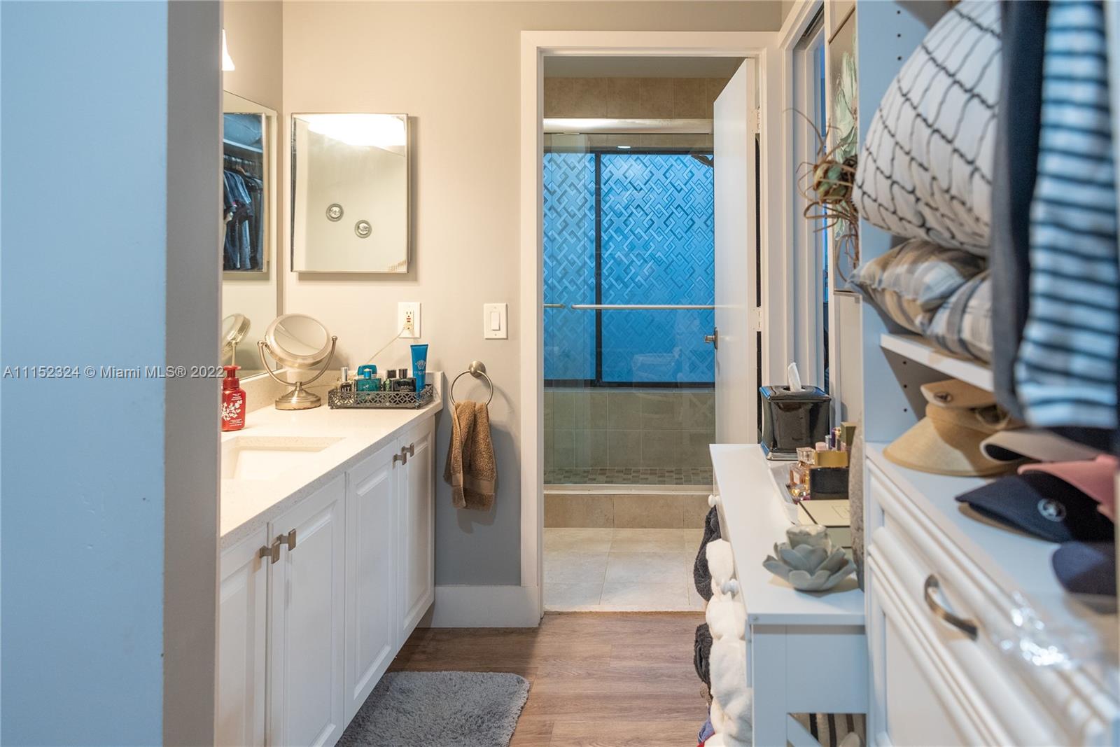 21356 Summertrace Circle Boca Raton, FL 33428 - Photo 8 of 21 a bathroom with a granite countertop sink and a mirror