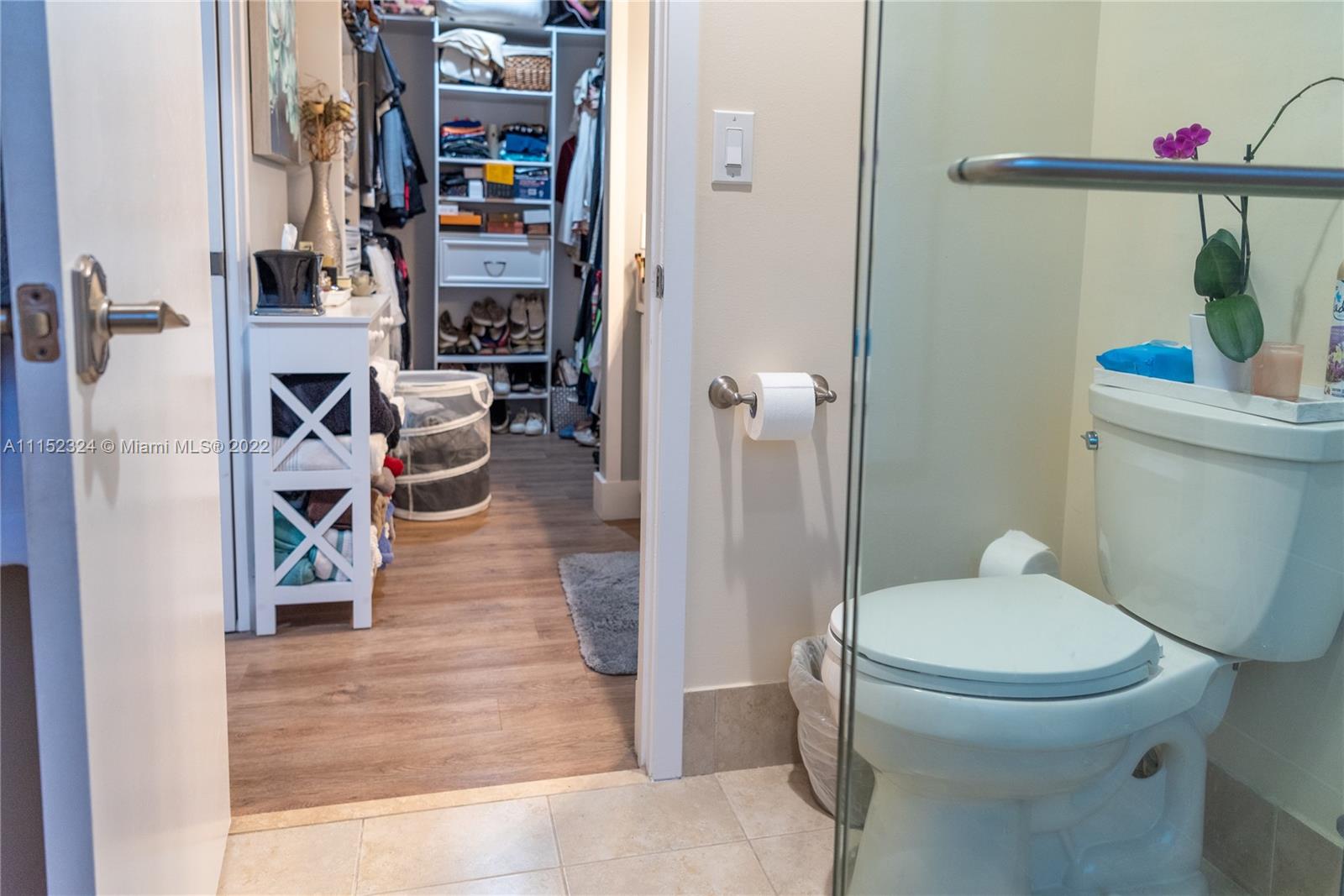 21356 Summertrace Circle Boca Raton, FL 33428 - Photo 9 of 21 a bathroom with a toilet and a shower