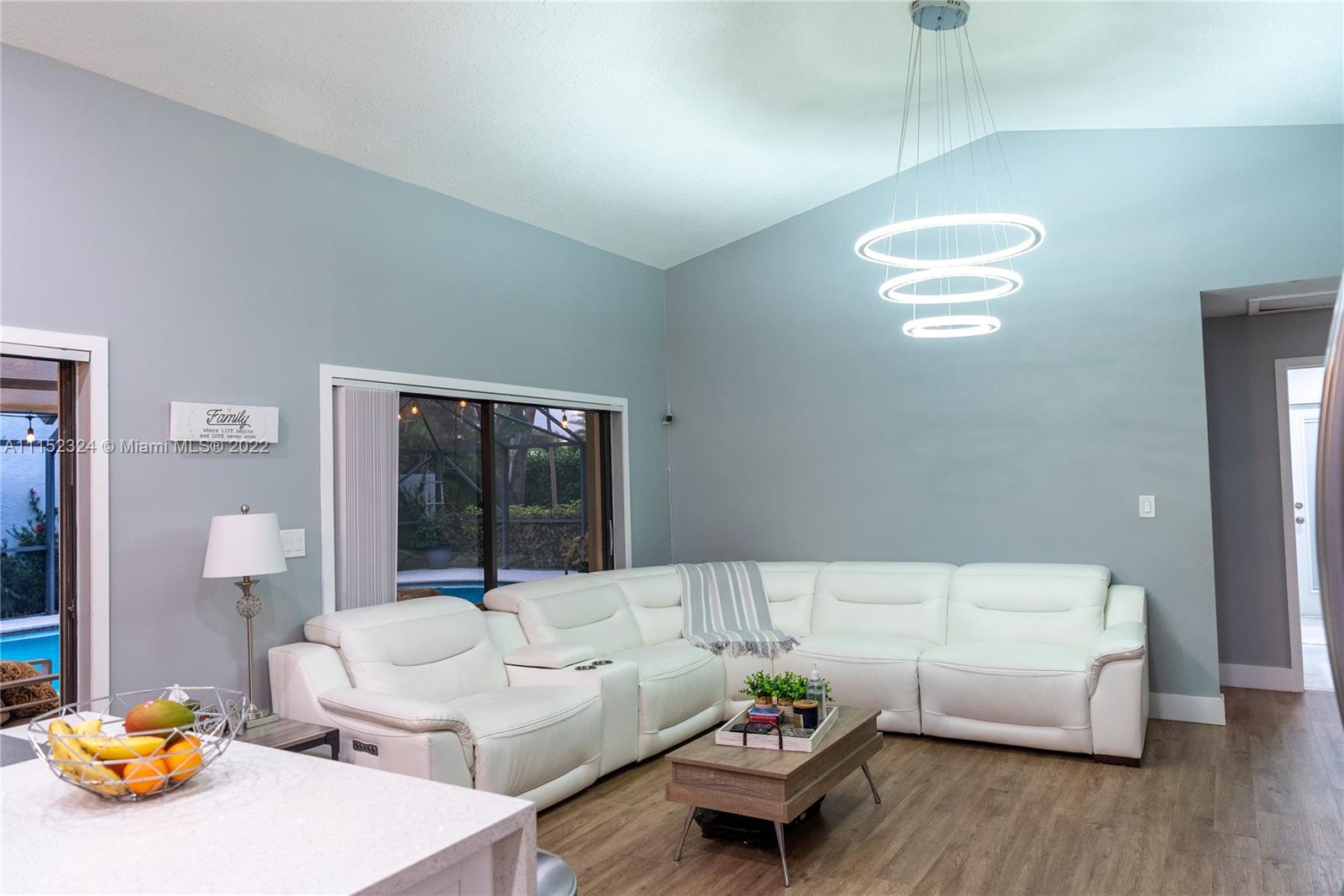21356 Summertrace Circle Boca Raton, FL 33428 - Photo 10 of 21 a living room with furniture and wooden floor