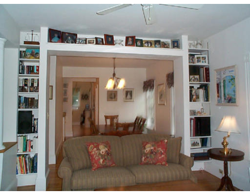 23 Turkey Shore Road Ipswich, MA 01938 - Photo 3 of 9 a living room with furniture and a fireplace