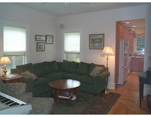 23 Turkey Shore Road Ipswich, MA 01938 - Photo 6 of 9 a living room with furniture and a table