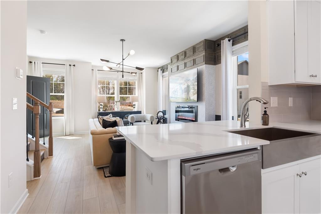 204 Daybreak Lane Newnan, GA 30265 - Photo 20 of 48 a view of a kitchen area with furniture and large window