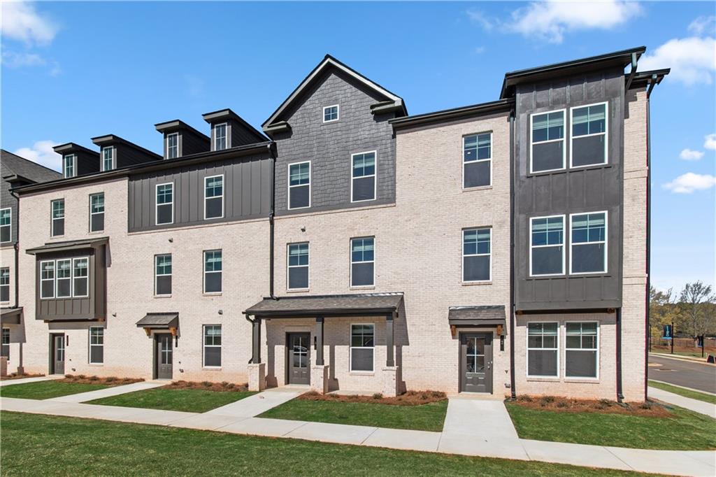 204 Daybreak Lane Newnan, GA 30265 - Photo 3 of 48 front view of a house with a yard