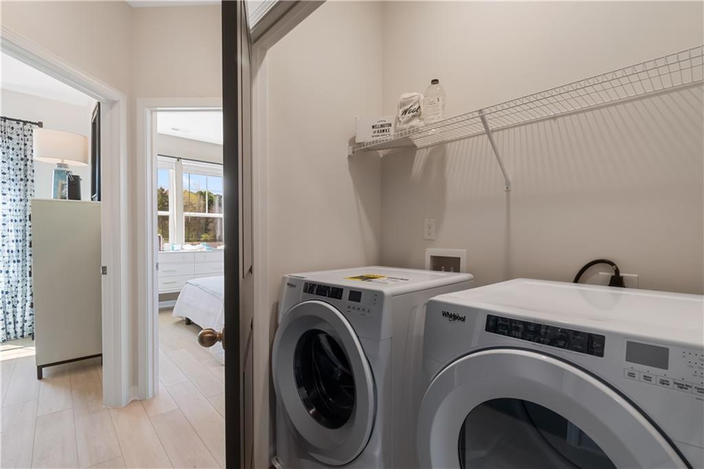 204 Daybreak Lane Newnan, GA 30265 - Photo 34 of 48 a utility room with dryer and washer