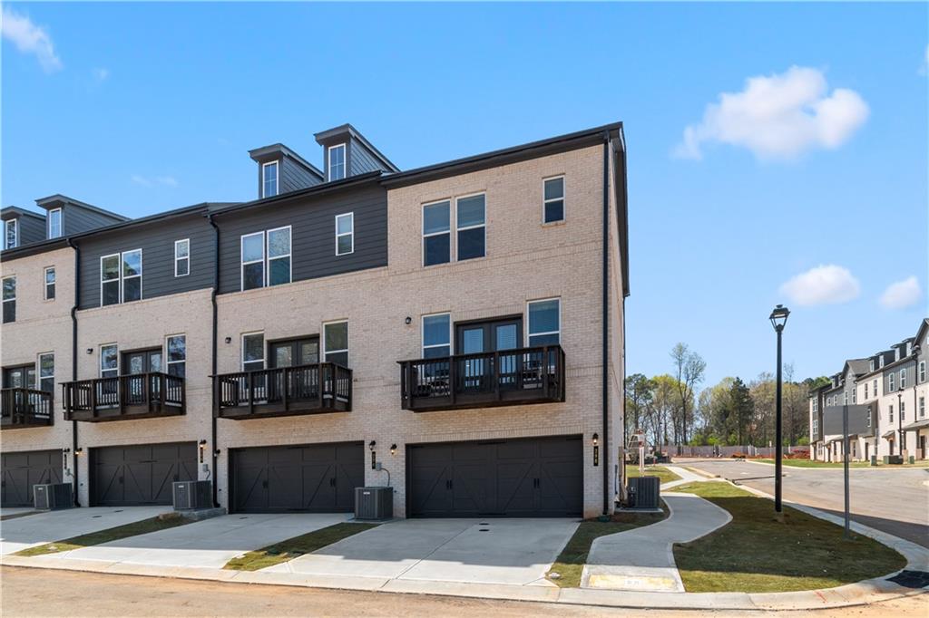 204 Daybreak Lane Newnan, GA 30265 - Photo 43 of 48 a front view of a building with street view