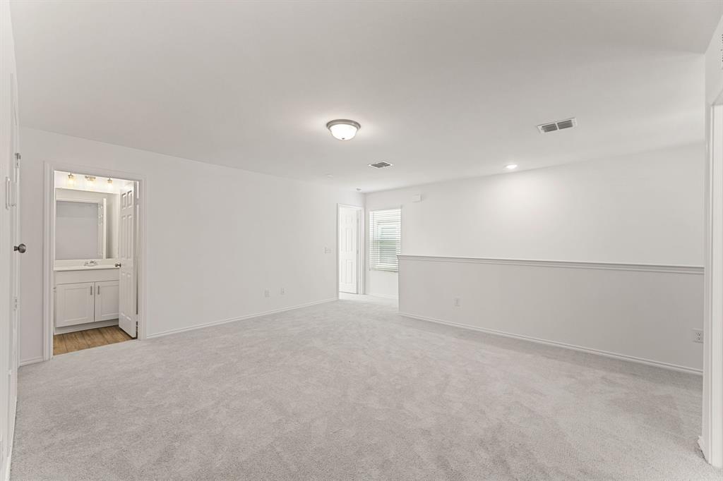 816 Breakwater Drive Princeton, TX 75407 - Photo 14 of 30 a view of an empty room