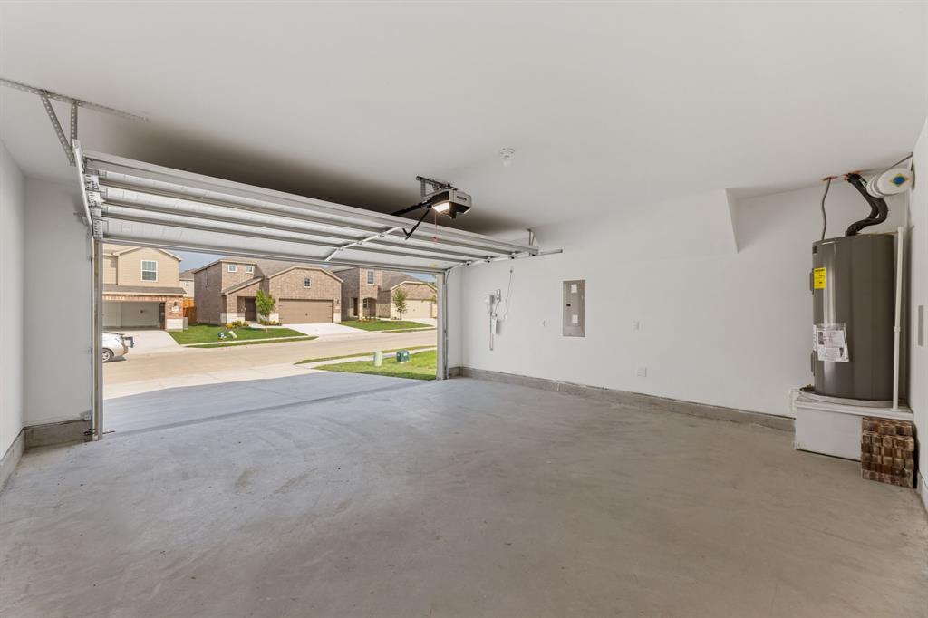 816 Breakwater Drive Princeton, TX 75407 - Photo 28 of 30 a view of a livingroom with wooden floor and a sink