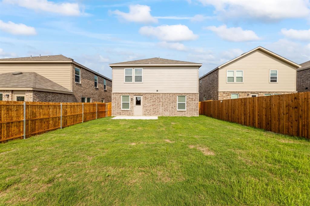 816 Breakwater Drive Princeton, TX 75407 - Photo 30 of 30 a view of a backyard of the house
