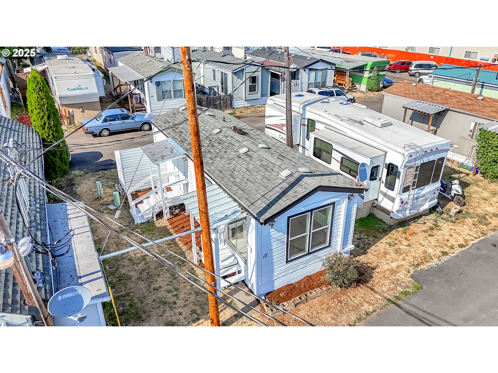 12726 Southeast Division Street, Unit 17 Portland, OR 97236 - Photo 10 of 26 a aerial view of a house with a yard