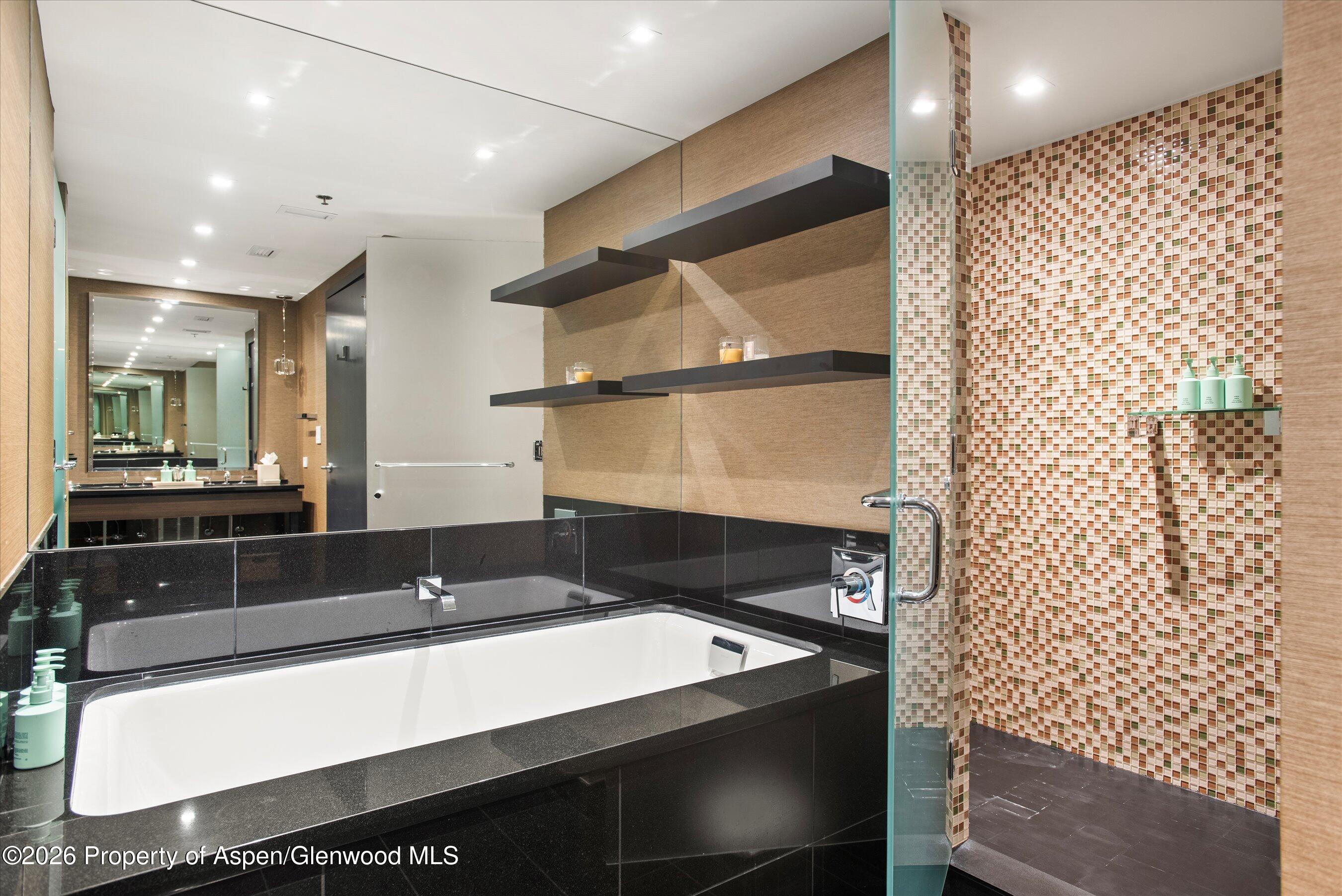 130 Wood Road, Unit 532 Snowmass Village, CO 81615 - Photo 11 of 15 a bathroom with a sink and a mirror