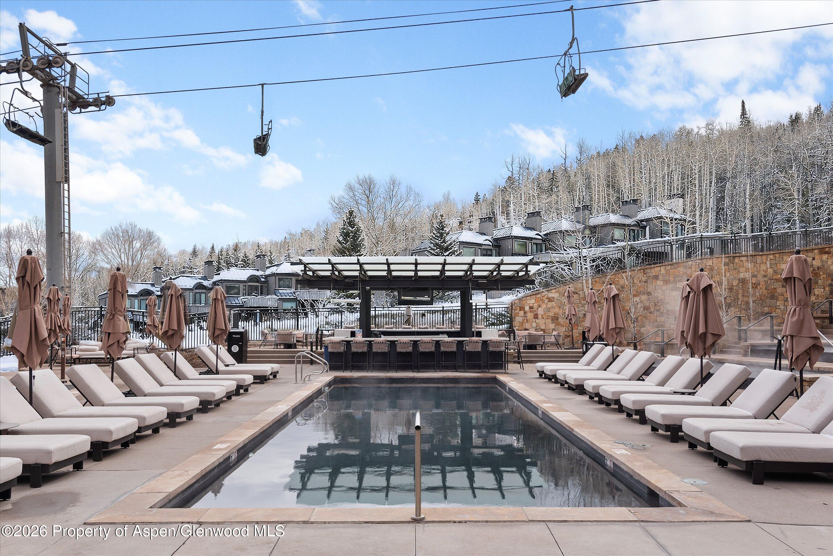 130 Wood Road, Unit 532 Snowmass Village, CO 81615 - Photo 15 of 15 a view of a balcony with couch and a potted plant